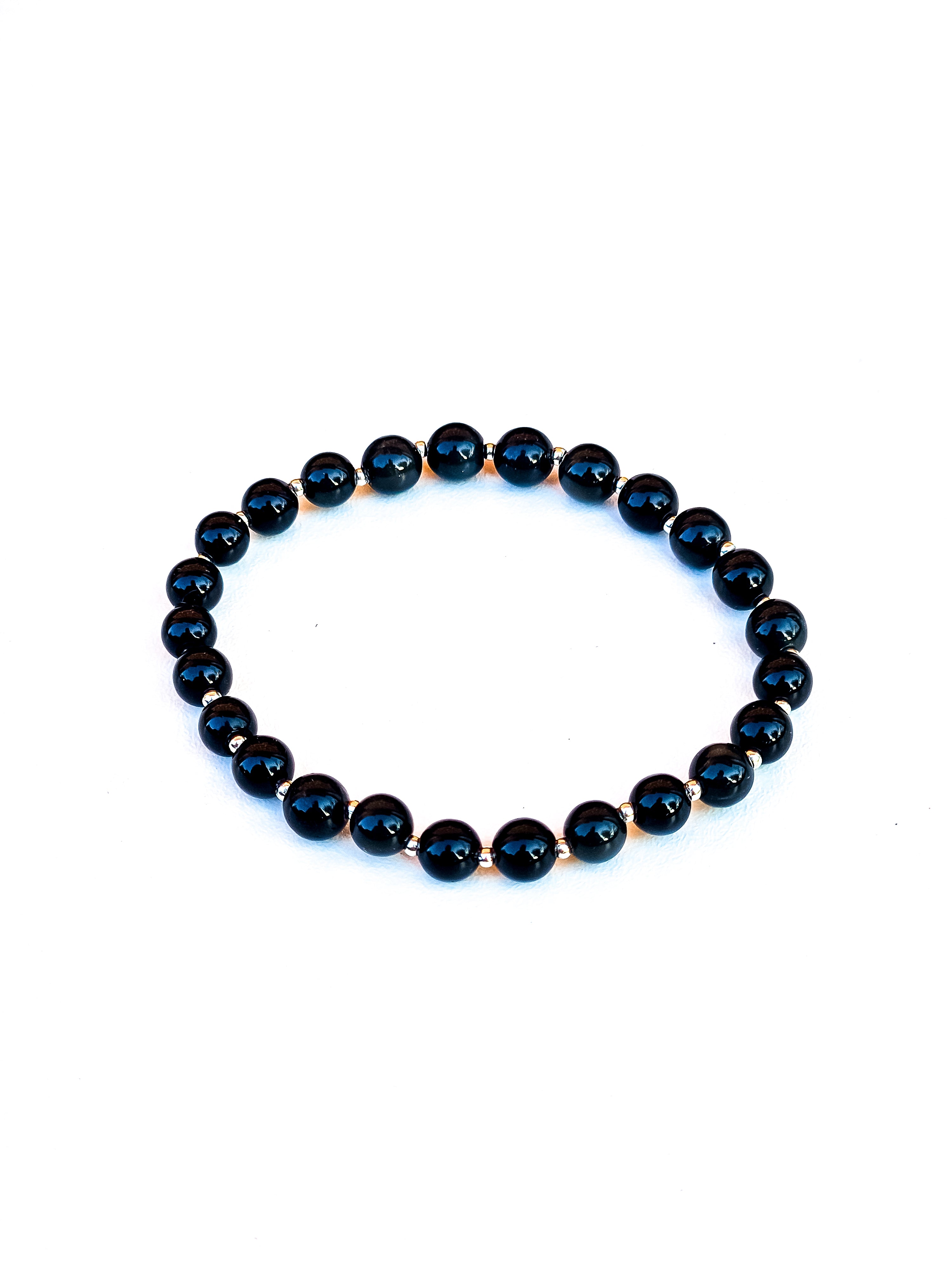Black obsidian (6 mm) bracelet with gold spacer beads