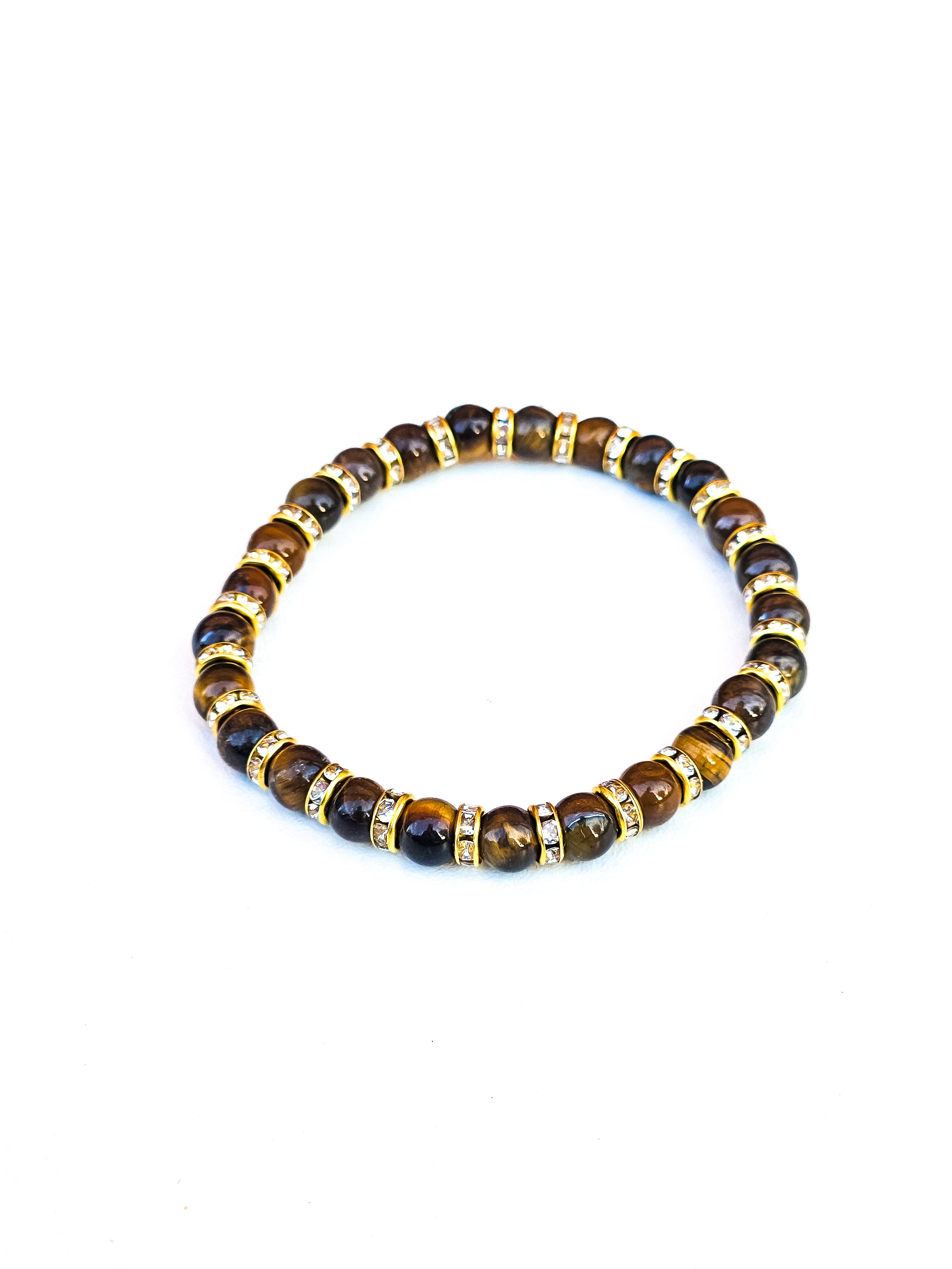 Bracelet • Tiger's eye (6 mm) with gold-plated spacers