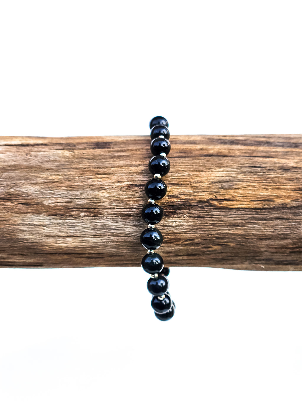 Black obsidian (6 mm) bracelet with gold spacer beads