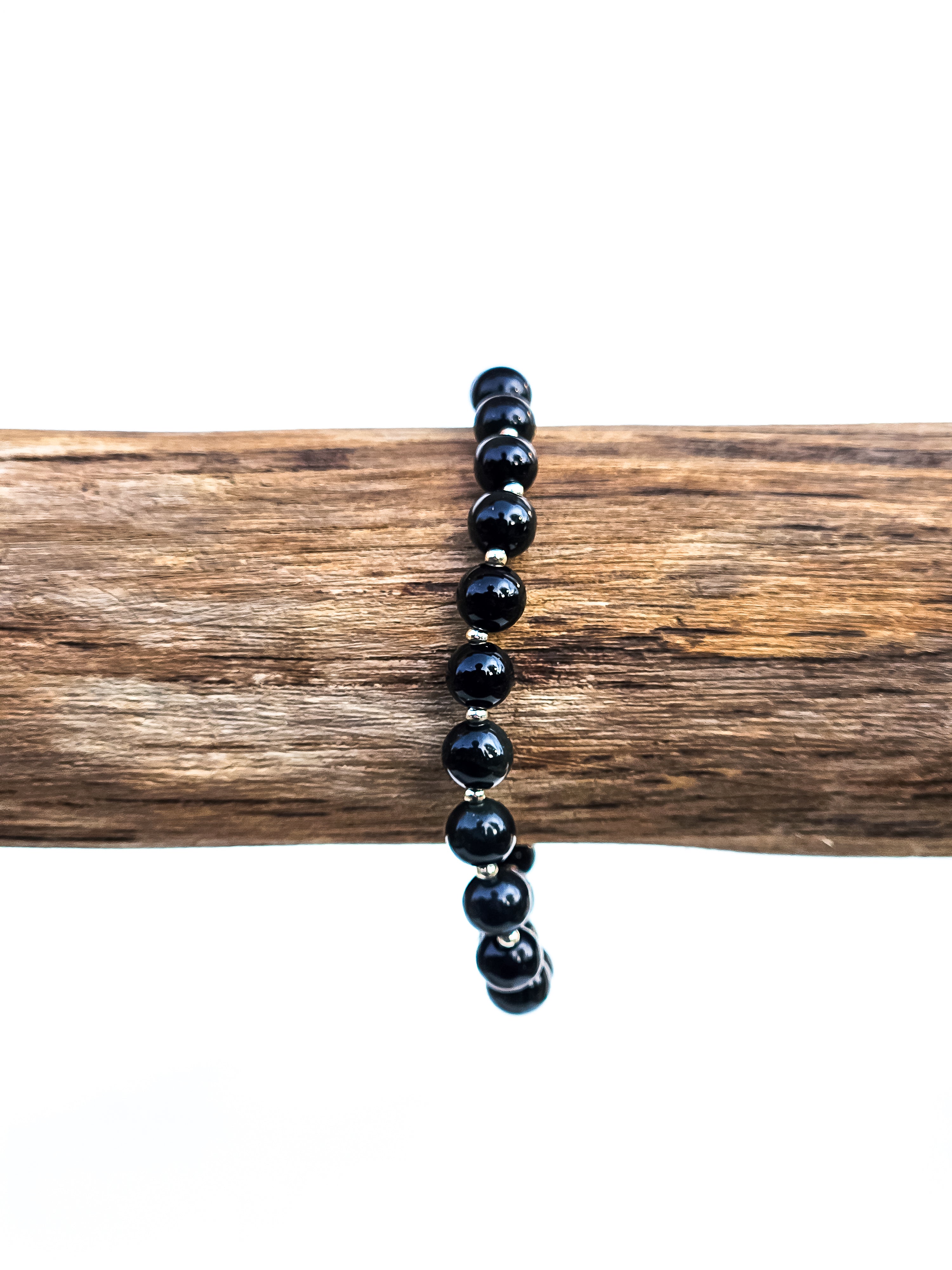 Black obsidian (6 mm) bracelet with gold spacer beads