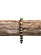 Bracelet • Tiger's eye (6 mm) with gold-plated spacers