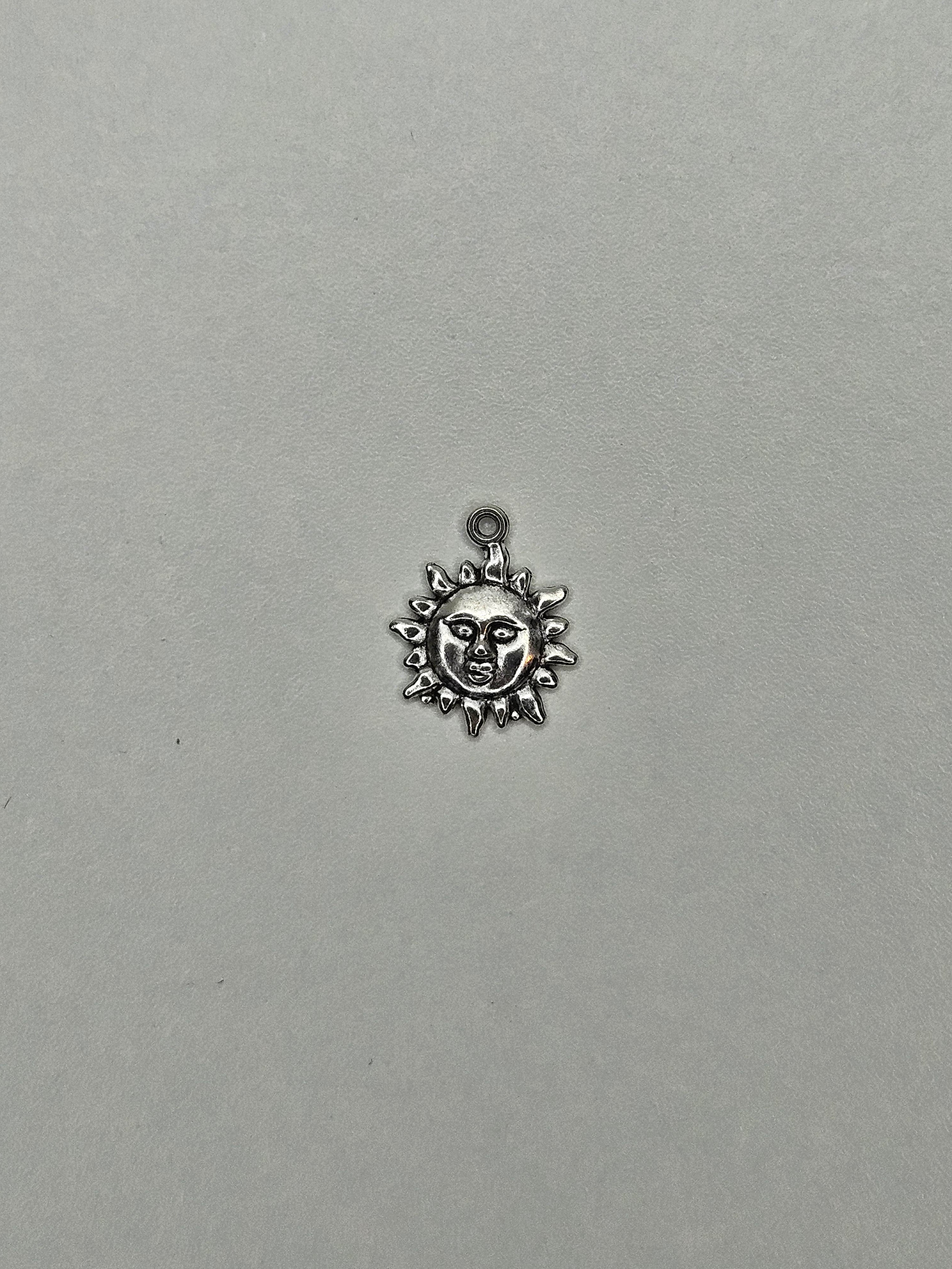 Pendentif soleil argent 004