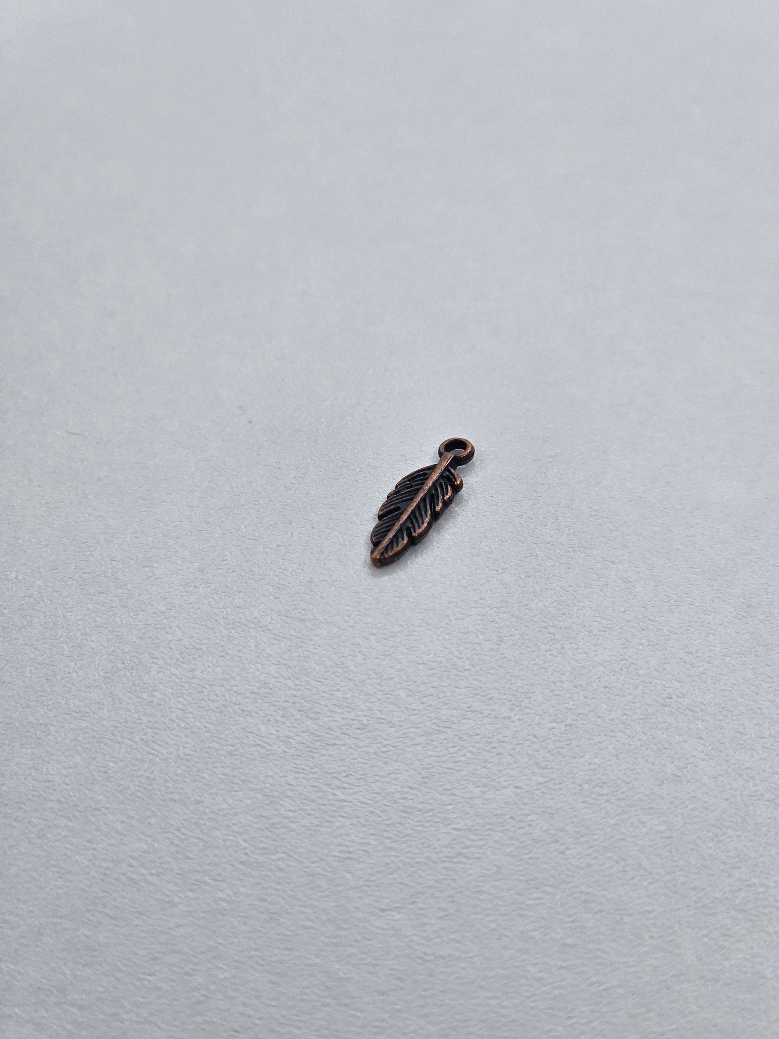 Pendentif plume bronze 001