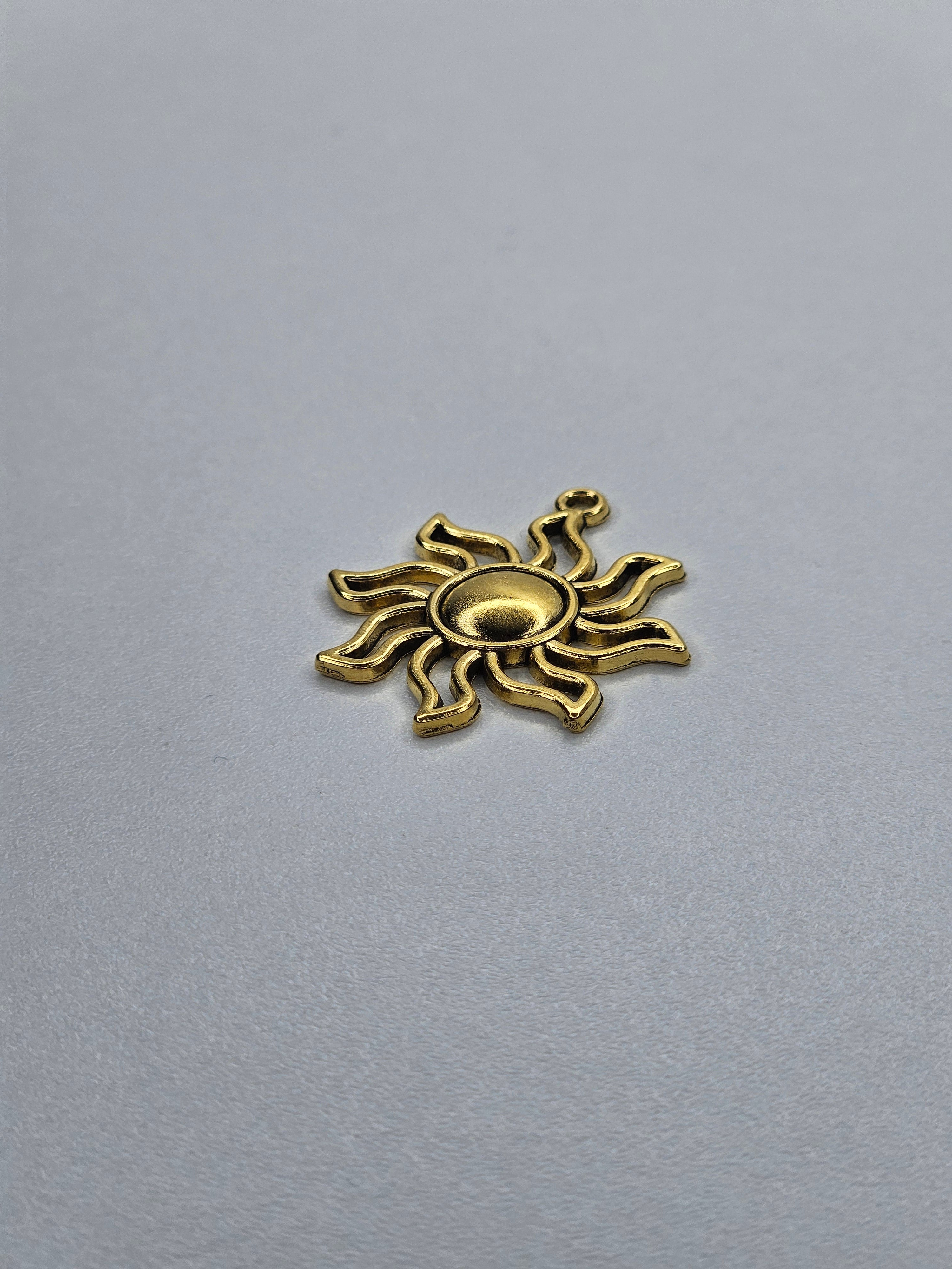 Pendentif soleil or 007