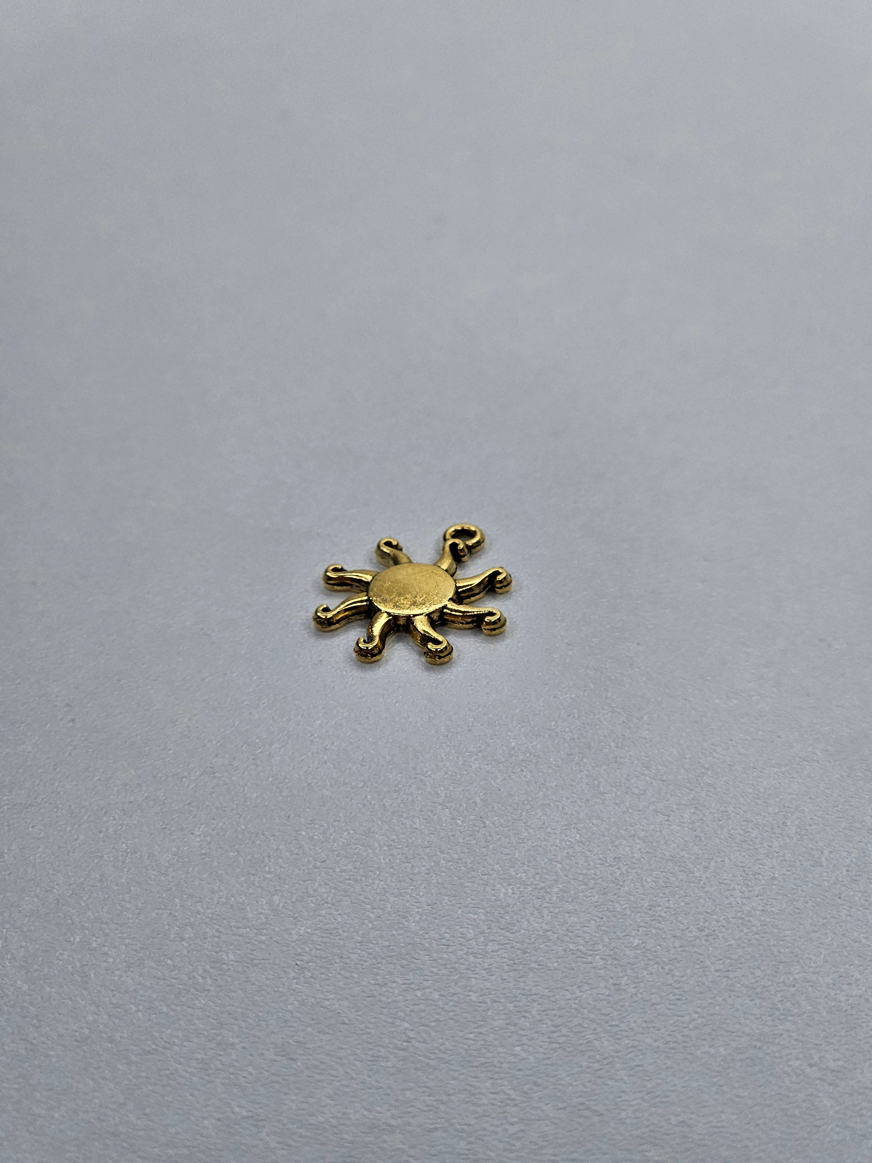 Pendentif soleil or 008