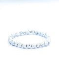 Bracelet • Pierre de lave teintée blanche (6 mm)
